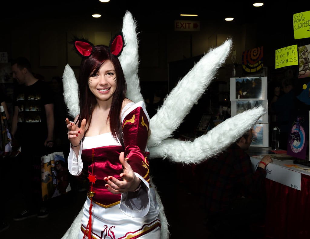 Original Skin Ahri Cosplayed by a woman